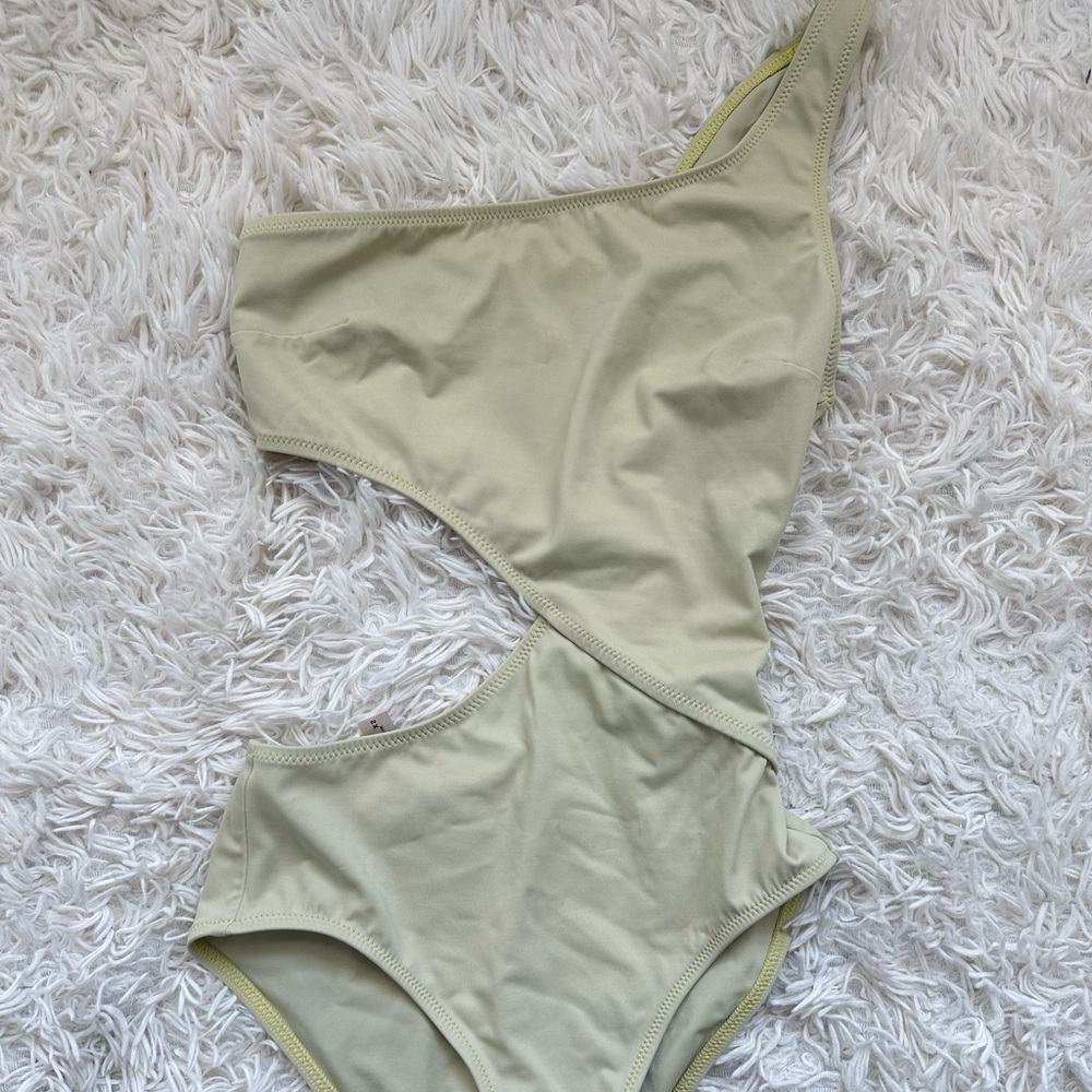 One piece bathing suit cut out